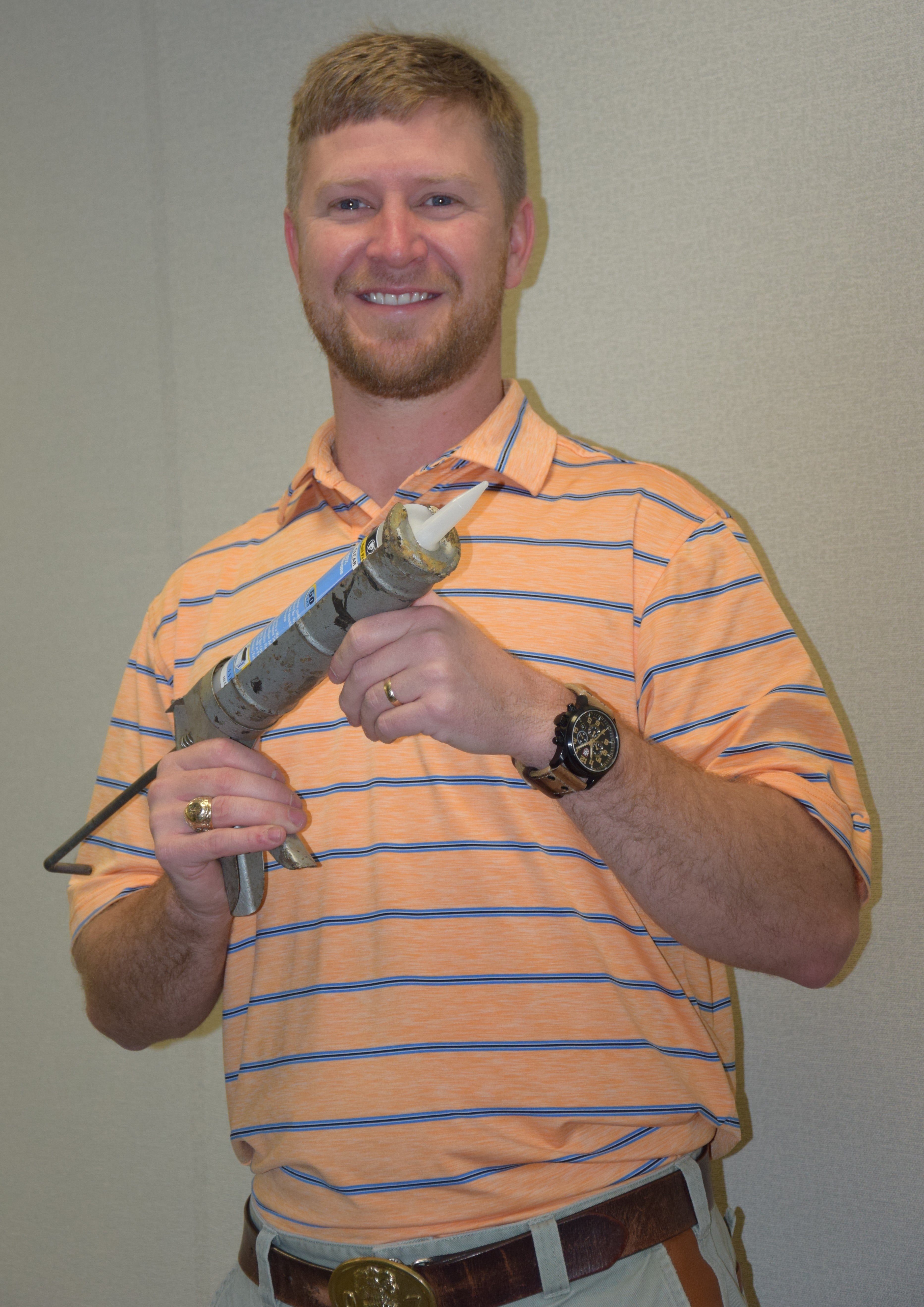 kevin with caulk gun